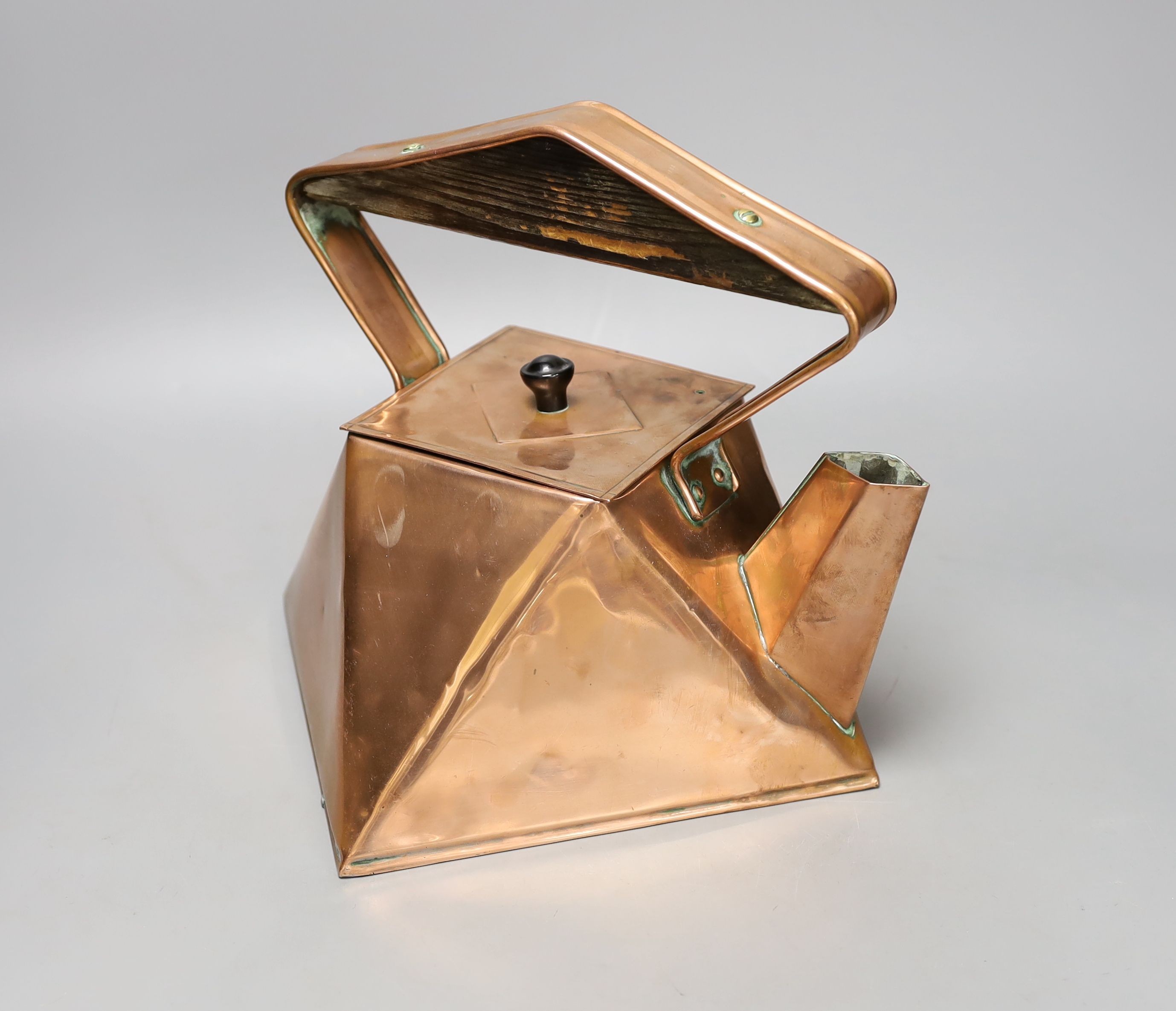 An Arts & Crafts geometric copper kettle, 23cm high, *This lot is being sold in aid of the charity Dogs Trust UK with 100% of the hammer price going to the charity